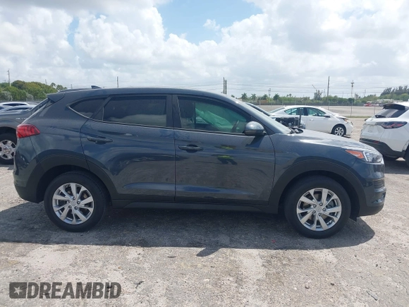 2021 Hyundai Tucson SE with VIN KM8J23A41MU291085, listed as a IAAI auction lot 41956974 with 93,932 mi miles. Bid and sale history available at carsss.com. Image 13.