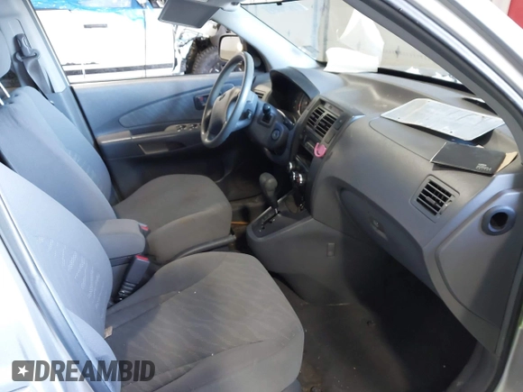 2005 Hyundai Tucson GL with VIN KM8JM12B25U171048, listed as a IAAI auction lot 41634099 with 188,086 mi miles. Bid and sale history available at carsss.com. Image 5.