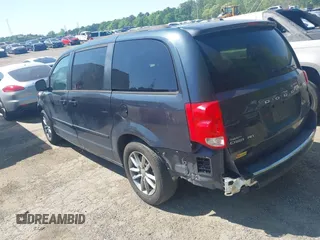 2014 Dodge Grand Caravan R/T with VIN 2C4RDGEGXER392525, listed as a IAAI auction lot 42036829 with 201,497 mi miles and . Bid and sale history available at DreamBid. Image 3.