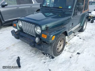 2004 Jeep Wrangler Sahara with VIN 1J4FA59S74P736918, listed as a IAAI auction lot 41632100 with NaN miles. Bid and sale history available at carsss.com. Image 16.