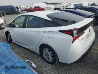 2021 Toyota Prius L Eco with VIN JTDKAMFU9M3146148, listed as a Copart auction lot 60747745 with 145,146 mi miles and Salvage title. Bid and sale history available at DreamBid. Image 2.