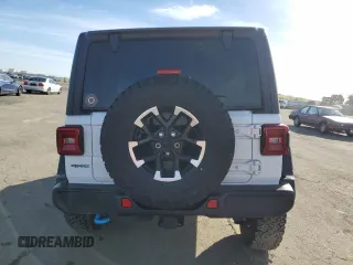 2024 Jeep Wrangler Rubicon with VIN 1C4RJXR6XRW115879, listed as a Copart auction lot 45816825 with 34,557 mi miles and Salvage Title. Bid and sale history available at DreamBid. Image 6.