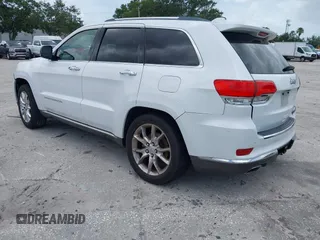 2014 Jeep Grand Cherokee Summit z VIN 1C4RJEJG1EC357948, wystawiony jako IAAI lot #42498652 z przebiegiem 213 715 mil mil oraz . Historia ofert i sprzedaży dostępna na DreamBid. Obrazek 3.