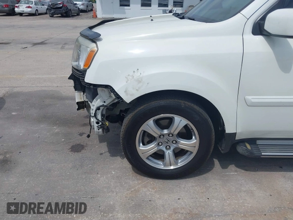 2014 Honda Pilot EX-L with VIN 5FNYF4H52EB055549, listed as a IAAI auction lot 42086456 with 292,594 mi miles and . Bid and sale history available at carsss.com. Image 6.