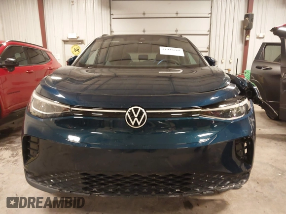 2023 Volkswagen ID.4 Pro z VIN 1V2DNPE84PC038042, wystawiony jako IAAI lot #41446269 z przebiegiem 12 878 mil mil oraz . Historia ofert i sprzedaży dostępna na DreamBid. Obrazek 13.