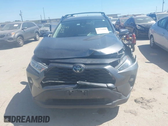 2021 Toyota RAV4 XLE with VIN 2T3W1RFV8MC118377, listed as a IAAI auction lot 41776108 with 80,217 mi miles. Bid and sale history available at carsss.com. Image 6.