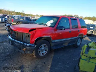 1999 GMC Yukon with VIN 1GKEK13R9XJ748190, listed as a IAAI auction lot 41317890 with 330,490 mi miles. Bid and sale history available at carsss.com. Image 18.