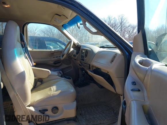 1998 Ford F-150 with VIN 1FTRX18L2WKA07312, listed as a IAAI auction lot 41327373 with 263,459 mi miles and . Bid and sale history available at DreamBid. Image 5.