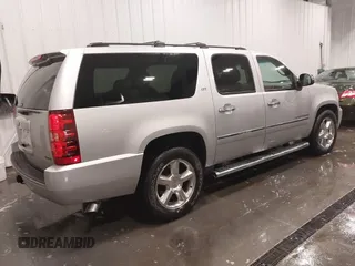 2011 Chevrolet Suburban LTZ with VIN 1GNSKKE31BR143238, listed as a IAAI auction lot 41621927 with 224,313 mi miles and . Bid and sale history available at DreamBid. Image 4.
