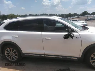 2017 Mazda CX-9 Signature with VIN JM3TCBEY2H0140598, listed as a IAAI auction lot 42561999 with 61,574 mi miles and . Bid and sale history available at DreamBid. Image 13.