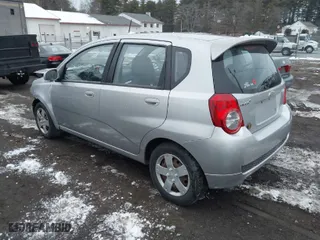 2010 Chevrolet Aveo LT w/1LT with VIN KL1TD6DEXAB047608, listed as a IAAI auction lot 41236863 with 63,284 mi miles. Bid and sale history available at carsss.com. Image 3.