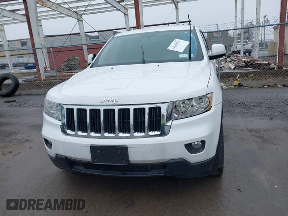 2013 Jeep Grand Cherokee Laredo with VIN 1C4RJFAG6DC557163, listed as a IAAI auction lot 42019052 with 125,058 mi miles. Bid and sale history available at carsss.com. Image 11.