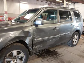 2011 Honda Pilot EX-L with VIN 5FNYF4H65BB020721, listed as a IAAI auction lot 41794436 with 113,630 mi miles and . Bid and sale history available at carsss.com. Image 6.