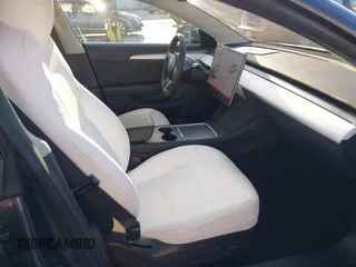 2022 Tesla Model 3 Long Range with VIN 5YJ3E1EB4NF293635, listed as a IAAI auction lot 41388234 with 28,396 mi miles and . Bid and sale history available at DreamBid. Image 5.