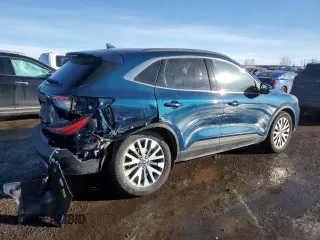 2020 Ford Escape Titanium Hybrid with VIN 1FMCU9DZXLUB46252, listed as a Copart auction lot 88801835 with 64,443 mi miles and Salvage title. Bid and sale history available at DreamBid. Image 3.
