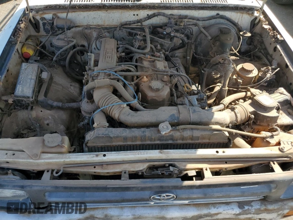 1994 Toyota Pickup z VIN 4TARN81A3RZ166726, wystawiony jako Copart lot #73611754 z przebiegiem 247 038 mil mil oraz Czysty tytuł • Clean title. Historia ofert i sprzedaży dostępna na DreamBid. Obrazek 11.