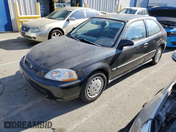 1997 Honda Civic DX with VIN 2HGEJ6344VH119405, listed as a Copart auction lot 71070544 with 26,621 mi miles and Salvage Title. Bid and sale history available at DreamBid. Image 1.