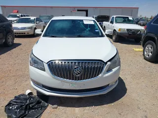 2016 Buick LaCrosse Leather with VIN 1G4GB5G31GF172921, listed as a IAAI auction lot 42101415 with 84,398 mi miles. Bid and sale history available at carsss.com. Image 12.
