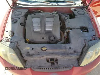 2003 Hyundai Tiburon GT z VIN KMHHN65F53U041351, wystawiony jako Copart lot #52332395 z przebiegiem 194 821 mil mil oraz Czysty tytuł • Clean title. Historia ofert i sprzedaży dostępna na DreamBid. Obrazek 11.