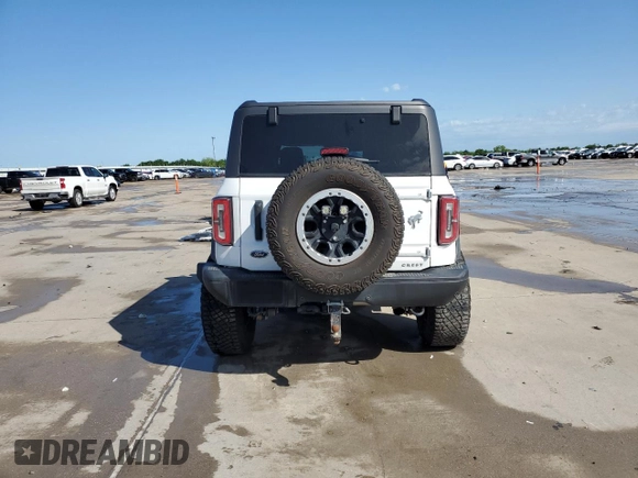 2021 Ford Bronco с VIN 1FMDE5CP3MLB04071, выставлен на аукционе Copart как лот 54220505 с пробегом 28 385 миль миль и Списание • Salvage title. История ставок и продаж доступна на DreamBid. Изображение 6.