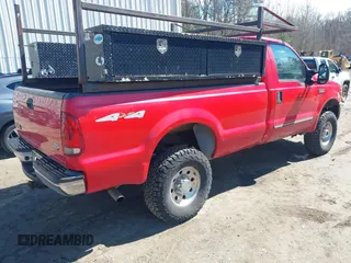 1999 Ford Super Duty F-250 XL with VIN 1FTNF21LXXEE17017, listed as a IAAI auction lot 41899851 with 115,353 mi miles. Bid and sale history available at carsss.com. Image 4.