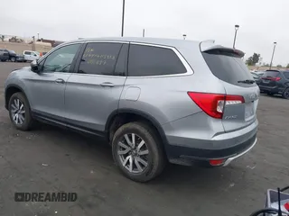 2019 Honda Pilot EX-L with VIN 5FNYF6H54KB055687, listed as a IAAI auction lot 42050539 with 50,989 mi miles and . Bid and sale history available at carsss.com. Image 3.