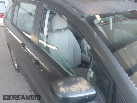 2012 Mazda 5 Touring with VIN JM1CW2CLXC0111947, listed as a IAAI auction lot 42690065 with 116,308 mi miles and . Bid and sale history available at DreamBid. Image 6.