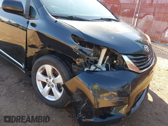 2012 Toyota Sienna LE AAS with VIN 5TDKK3DC6CS238848, listed as a IAAI auction lot 41728728 with 142,240 mi miles. Bid and sale history available at carsss.com. Image 6.