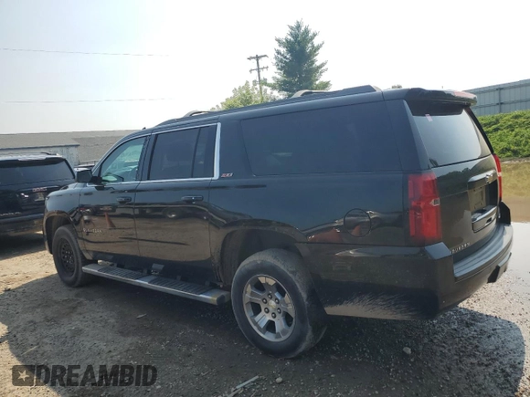 2015 Chevrolet Suburban LT with VIN 1GNSKJKC8FR551790, listed as a Copart auction lot 64694485 with 187,367 mi miles and Clean title. Bid and sale history available at DreamBid. Image 2.
