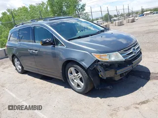 2011 Honda Odyssey Touring с VIN 5FNRL5H95BB081337, выставлен на аукционе IAAI как лот 42220384 с пробегом 260 022 миль миль и . История ставок и продаж доступна на DreamBid. Изображение 1.