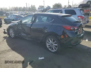 2017 Mazda 3 Touring with VIN 3MZBN1L7XHM102386, listed as a Copart auction lot 48802165 with 128,404 mi miles and Salvage Title. Bid and sale history available at carsss.com. Image 2.
