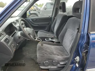 1999 Honda CR-V LX with VIN JHLRD1840XC037215, listed as a Copart auction lot 71116744 with 156,385 mi miles and Salvage Title. Bid and sale history available at carsss.com. Image 7.