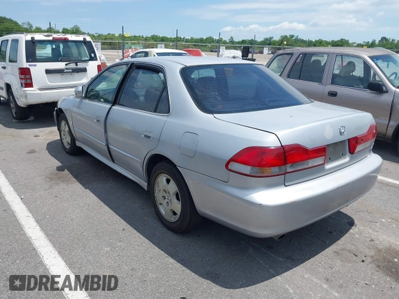 2001 Honda Accord EX z VIN 1HGCG165X1A058857, wystawiony jako IAAI lot #39264541 z przebiegiem 184 645 mil mil oraz . Historia ofert i sprzedaży dostępna na DreamBid. Obrazek 3.