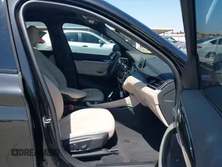 2021 BMW X1 sDrive28i with VIN WBXJG7C07M3M65841, listed as a IAAI auction lot 41877032 with 79,817 mi miles and . Bid and sale history available at DreamBid. Image 5.