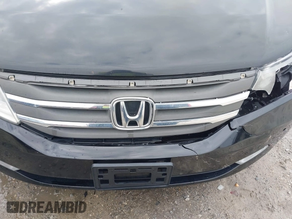 2012 Honda Odyssey Touring with VIN 5FNRL5H96CB058828, listed as a IAAI auction lot 41731389 with 152,295 mi miles and . Bid and sale history available at DreamBid. Image 17.