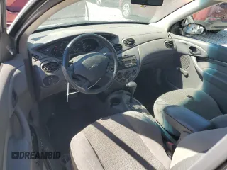 2001 Ford Focus ZX3 z VIN 3FAFP313X1R243418, wystawiony jako Copart lot #48558175 z przebiegiem 43 257 mil mil oraz Szkoda całkowita • Salvage title. Historia ofert i sprzedaży dostępna na DreamBid. Obrazek 8.