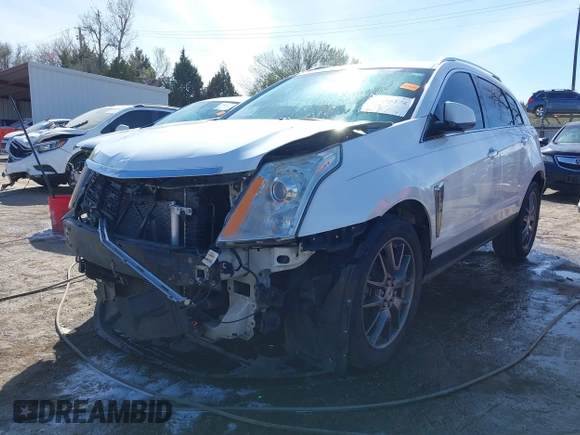 2014 Cadillac SRX Performance Collection with VIN 3GYFNCE31ES646075, listed as a IAAI auction lot 41856378 with 172,379 mi miles. Bid and sale history available at carsss.com. Image 2.