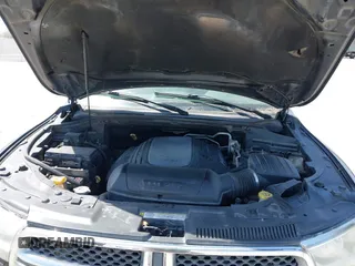 2013 Dodge Durango Crew with VIN 1C4SDHDT5DC637535, listed as a IAAI auction lot 41867982 with 162,569 mi miles and . Bid and sale history available at DreamBid. Image 10.