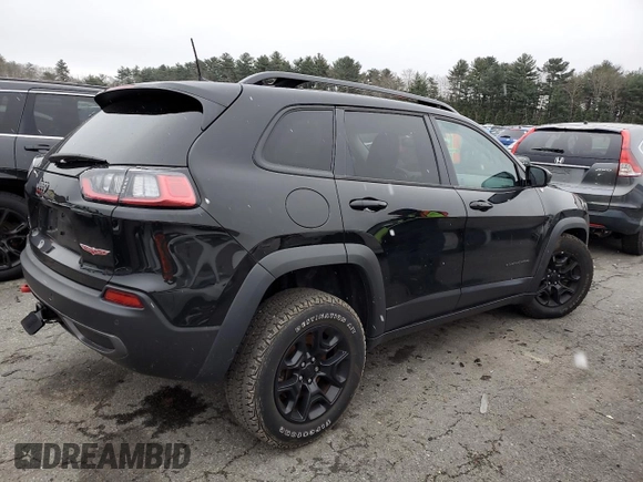 2022 Jeep Cherokee Trailhawk with VIN 1C4PJMBX3ND502322, listed as a Copart auction lot 85561444 with 57,630 mi miles and Salvage Title. Bid and sale history available at carsss.com. Image 3.