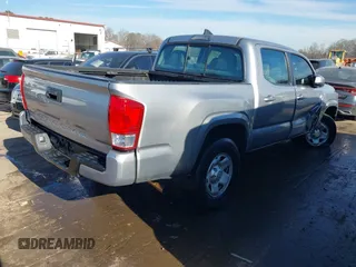 2017 Toyota Tacoma SR with VIN 5TFAX5GN2HX096442, listed as a IAAI auction lot 41667984 with 63,377 mi miles. Bid and sale history available at carsss.com. Image 4.