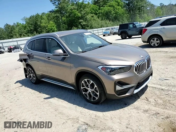 2020 BMW X1 xDrive28i z VIN WBXJG9C09L5R23653, wystawiony jako Copart lot #52771535 z przebiegiem 54 550 mil mil oraz Szkoda całkowita • Salvage title. Historia ofert i sprzedaży dostępna na DreamBid. Obrazek 12.