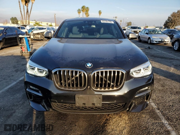 2020 BMW X4 M40i with VIN 5UX2V5C0XL9B53828, listed as a Copart auction lot 43190795 with 55,374 mi miles and Salvage title. Bid and sale history available at DreamBid. Image 5.