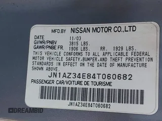 2004 Nissan 350Z Touring with VIN JN1AZ34E84T060682, listed as a IAAI auction lot 41616199 with 209,814 mi miles. Bid and sale history available at carsss.com. Image 9.