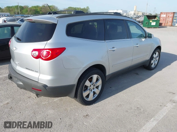 2011 Chevrolet Traverse LTZ with VIN 1GNKVLEDXBJ250325, listed as a IAAI auction lot 42107708 with 203,439 mi miles and . Bid and sale history available at DreamBid. Image 4.