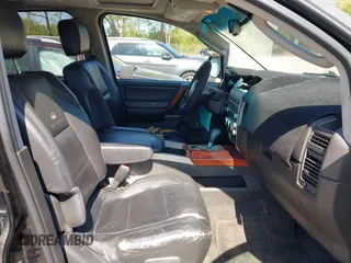 2005 Infiniti QX56 with VIN 5N3AA08C35N807884, listed as a IAAI auction lot 42040020 with 218,483 mi miles and . Bid and sale history available at DreamBid. Image 5.