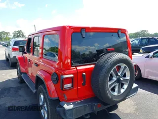 2021 Jeep Wrangler Unlimited Sahara with VIN 1C4HJXEN8MW622359, listed as a IAAI auction lot 42328958 with 100,450 mi miles and . Bid and sale history available at DreamBid. Image 3.
