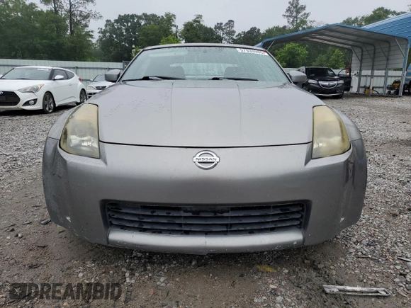 2003 Nissan 350Z Performance z VIN JN1AZ34D33T106988, wystawiony jako Copart lot #57933985 z przebiegiem 203 959 mil mil oraz Szkoda całkowita • Salvage title. Historia ofert i sprzedaży dostępna na DreamBid. Obrazek 5.