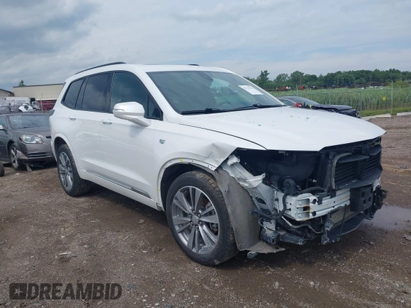 2020 Cadillac XT6 AWD Sport with VIN 1GYKPGRS0LZ140979, listed as a IAAI auction lot 42719794 with 111,420 mi miles and . Bid and sale history available at DreamBid. Image 1.