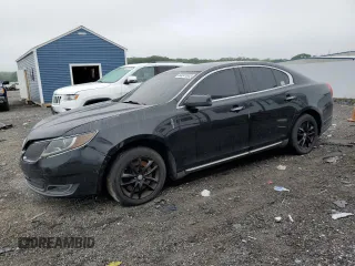 2015 Lincoln MKS z VIN 1LNHL9DK1FG601889, wystawiony jako Copart lot #60241635 z przebiegiem 249 283 mil mil oraz Czysty tytuł • Clean title. Historia ofert i sprzedaży dostępna na DreamBid. Obrazek 1.