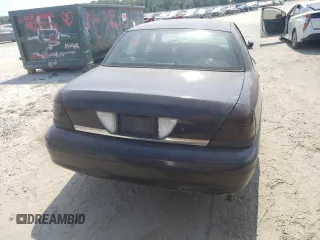 2001 Ford Crown Victoria Police Police Interceptor with VIN 2FAFP71W61X192261, listed as a Copart auction lot 69208974 with 163,632 mi miles and Salvage Title. Bid and sale history available at carsss.com. Image 6.